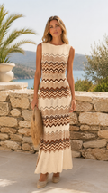 Front view of cream sleeveless chevron knit maxi dress with brown zigzag pattern